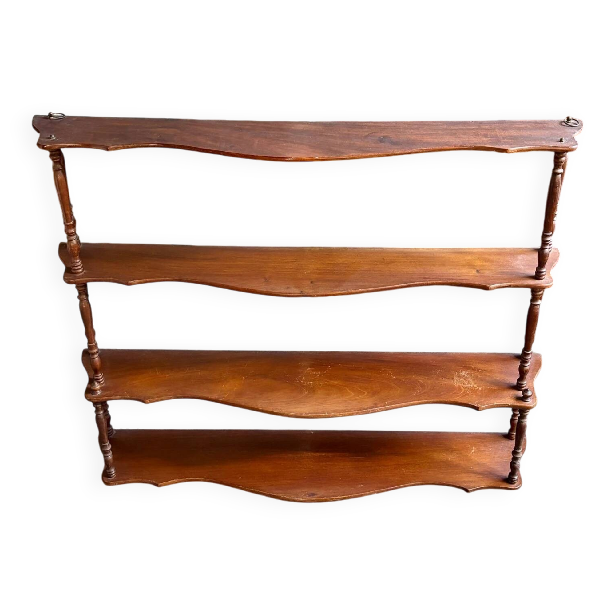 Curved and turned wooden wall shelf