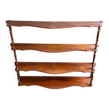 Curved and turned wooden wall shelf