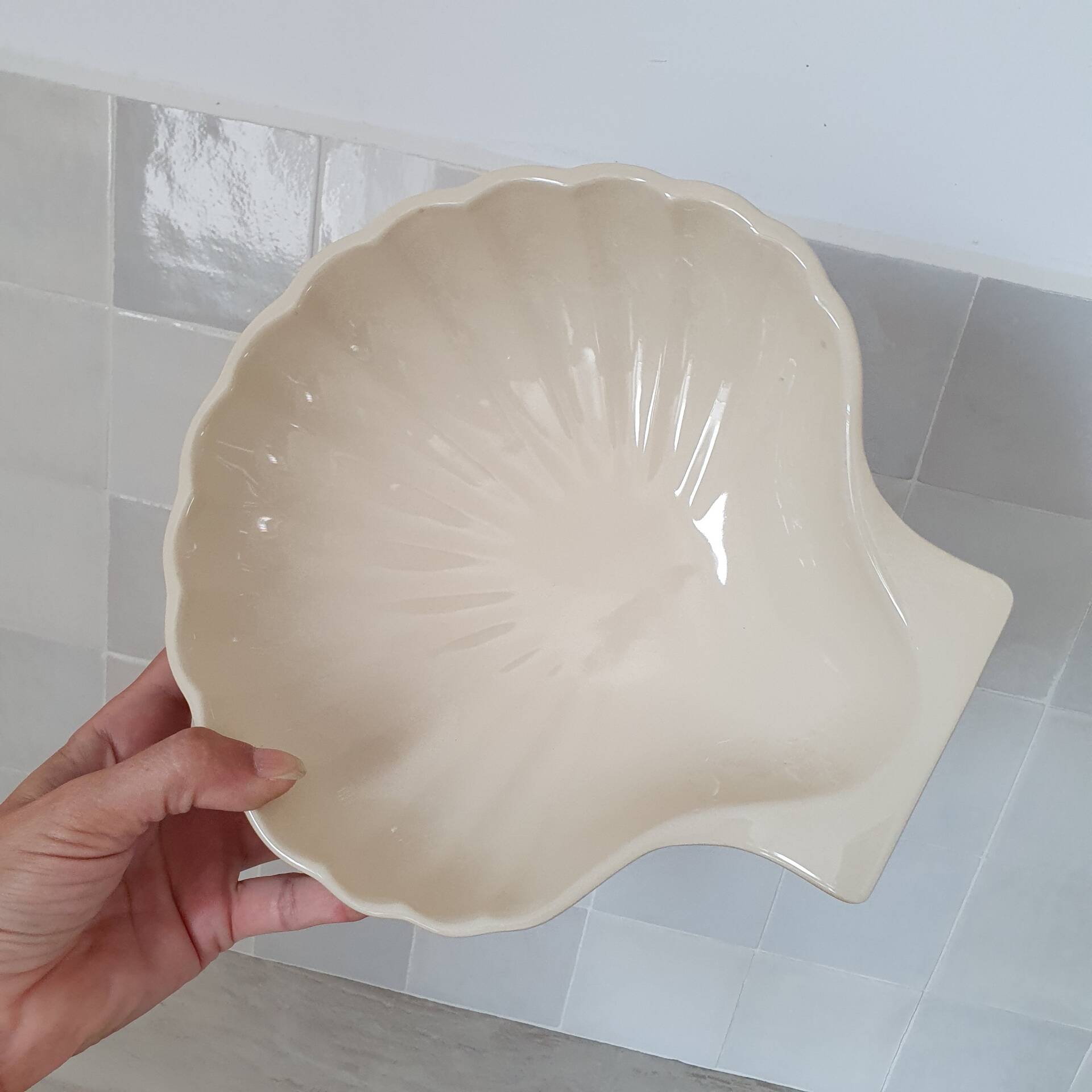 Brown and white ceramic shell bowl