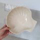 Brown and white ceramic shell bowl