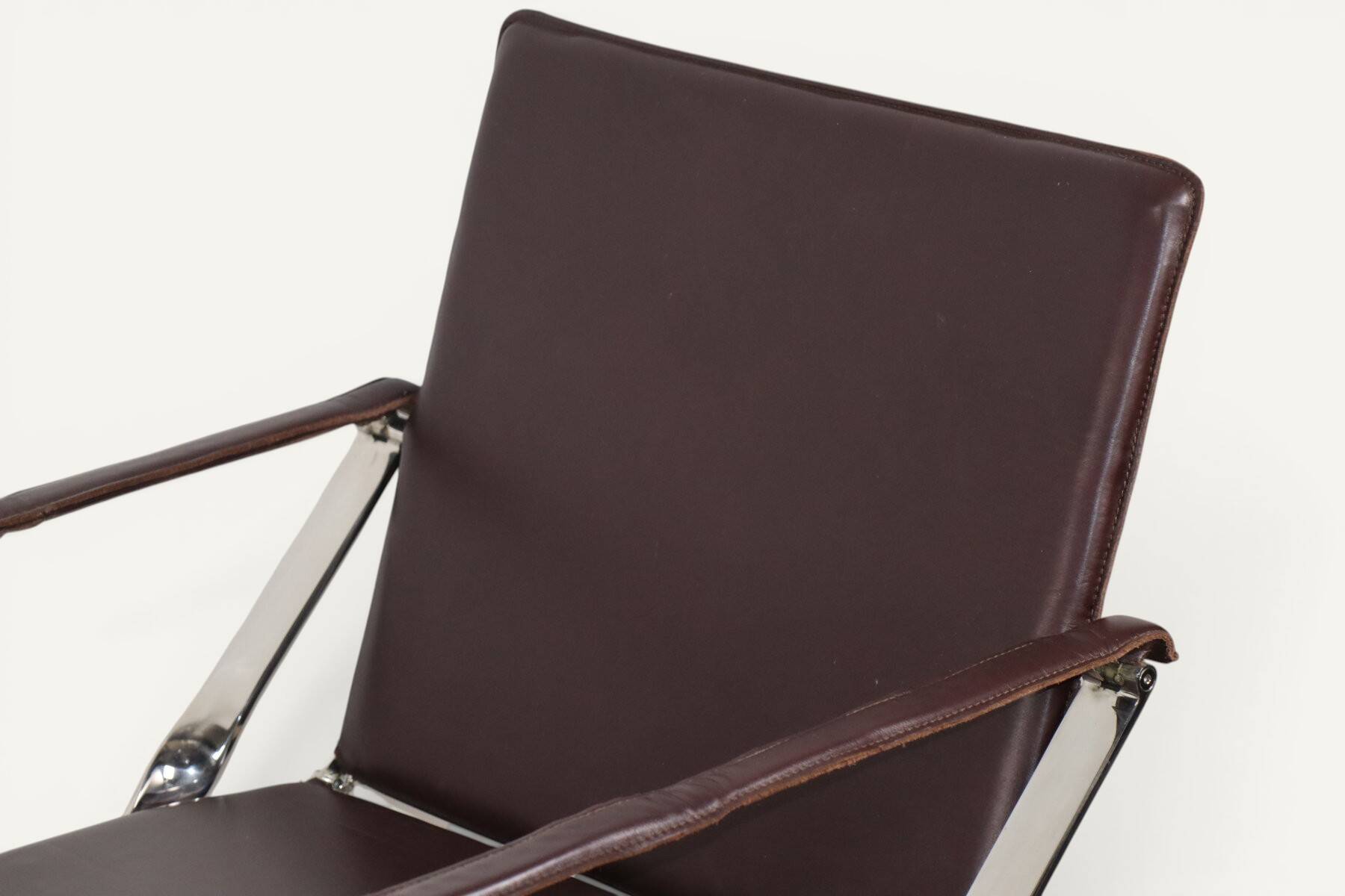Pair of leather and chrome metal armchairs, Italy - 1970