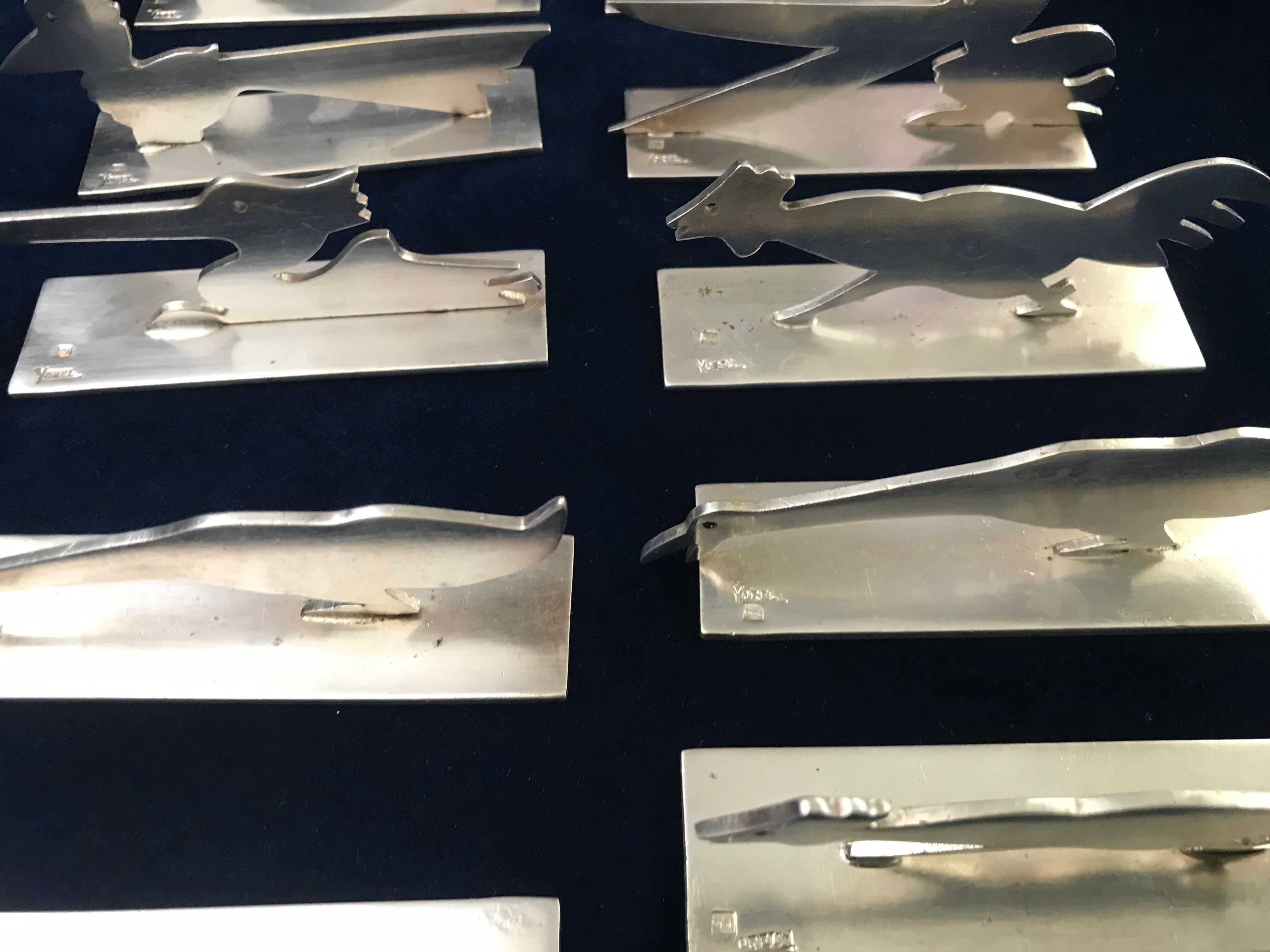 12 knife holders signed Yorel Art Deco
