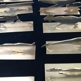 12 knife holders signed Yorel Art Deco