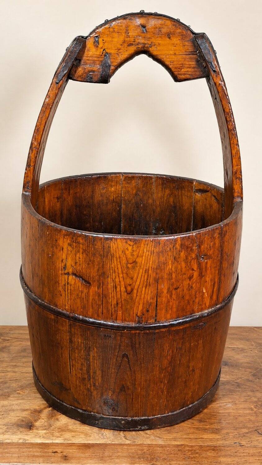 Old wooden well bucket with wrought iron bands – Late 19th century