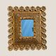 Antique mirror in gilded wood