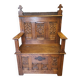 Fauteuil coffre néogothique en chêne