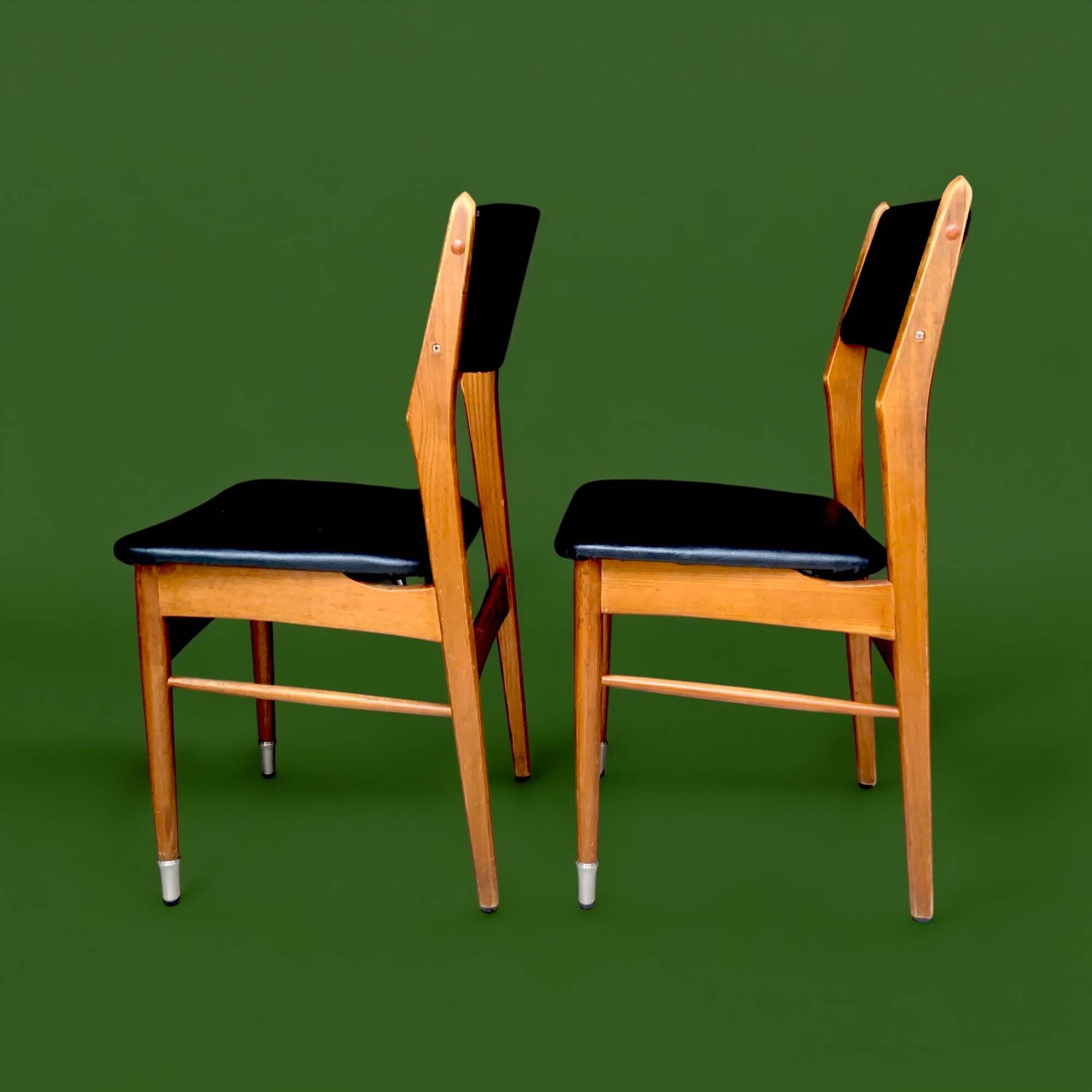 Pair of Scandinavian chairs in wood and black skai