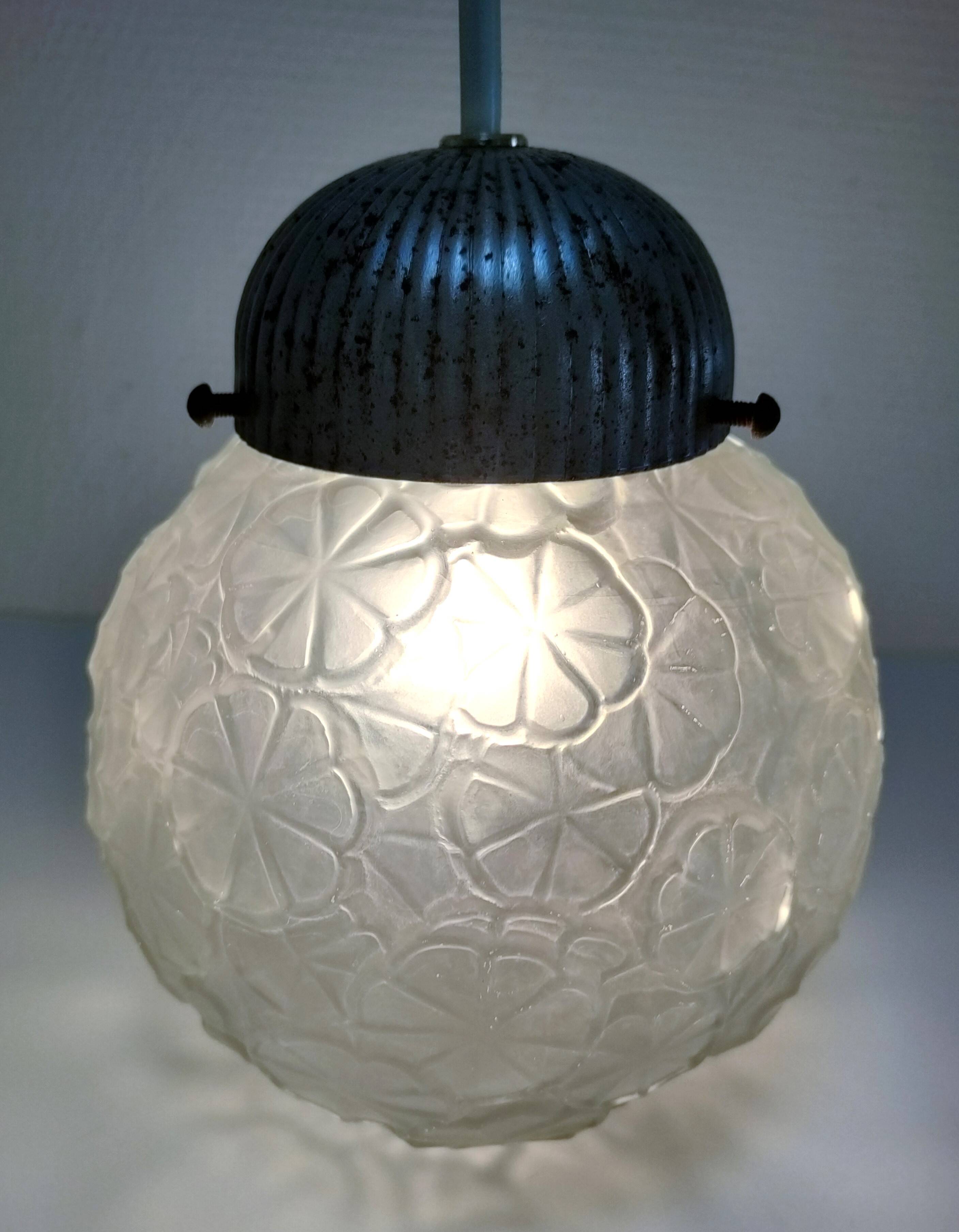 Art Deco glass ball pendant with floral decor