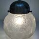 Art Deco glass ball pendant with floral decor