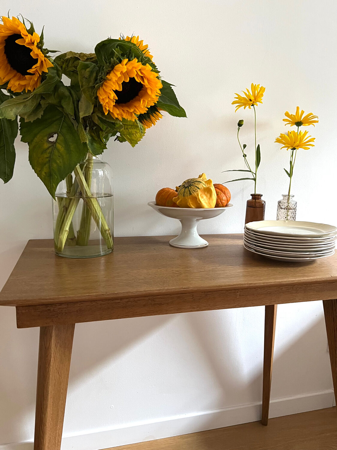 Side table with compass legs
