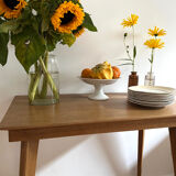 Side table with compass legs