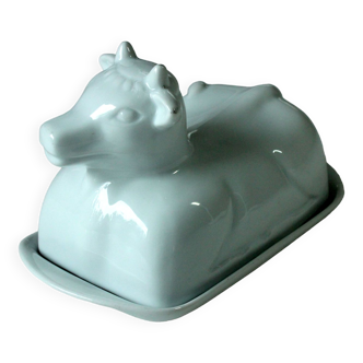White ceramic butter dish in the shape of a cow, vintage
