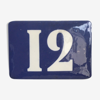 Old street number plate with number 12