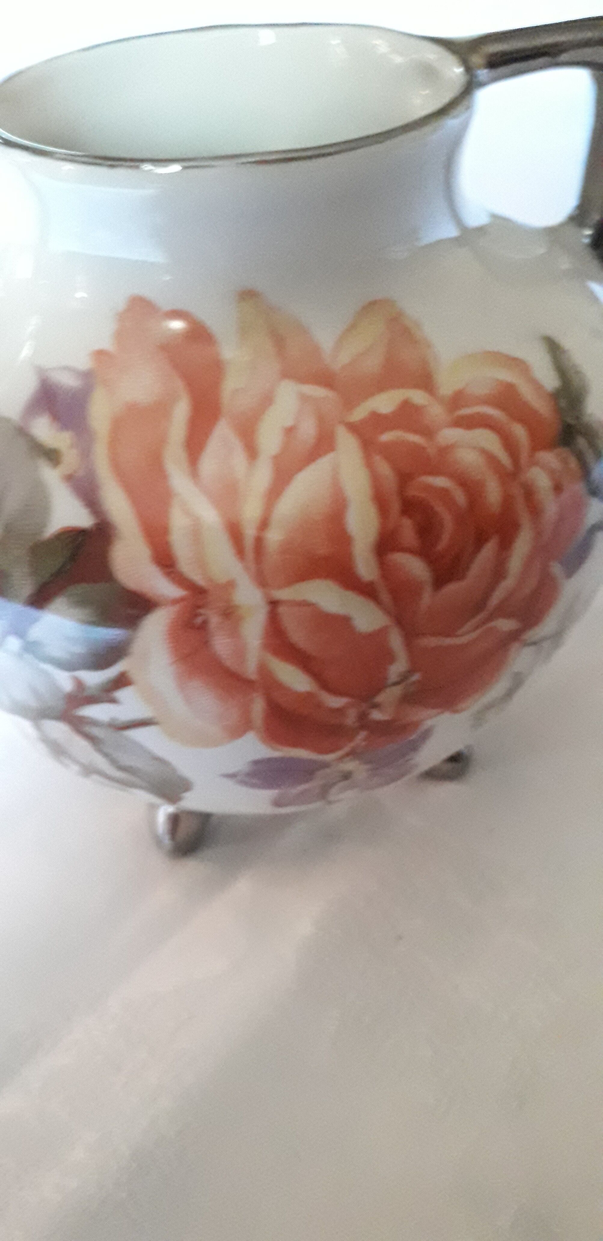 Small old vase with handles in Limoges porcelain.