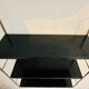 Adjustable vintage wall shelf in black metal and brass