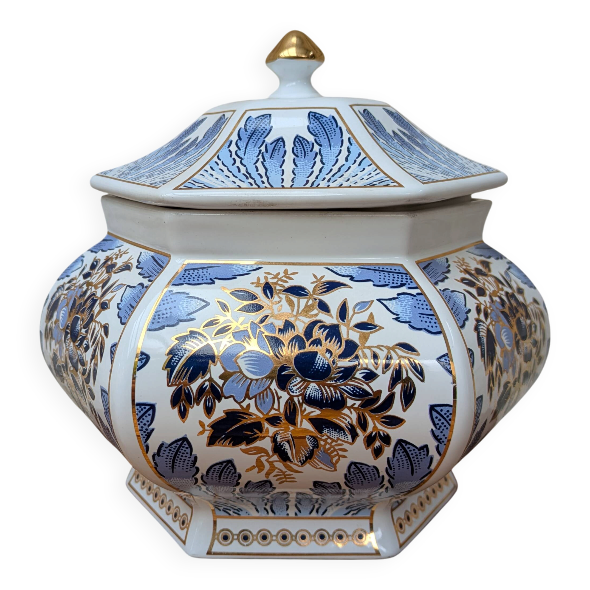 Decorative pot jar with a lid featuring a blue floral pattern and gilding.