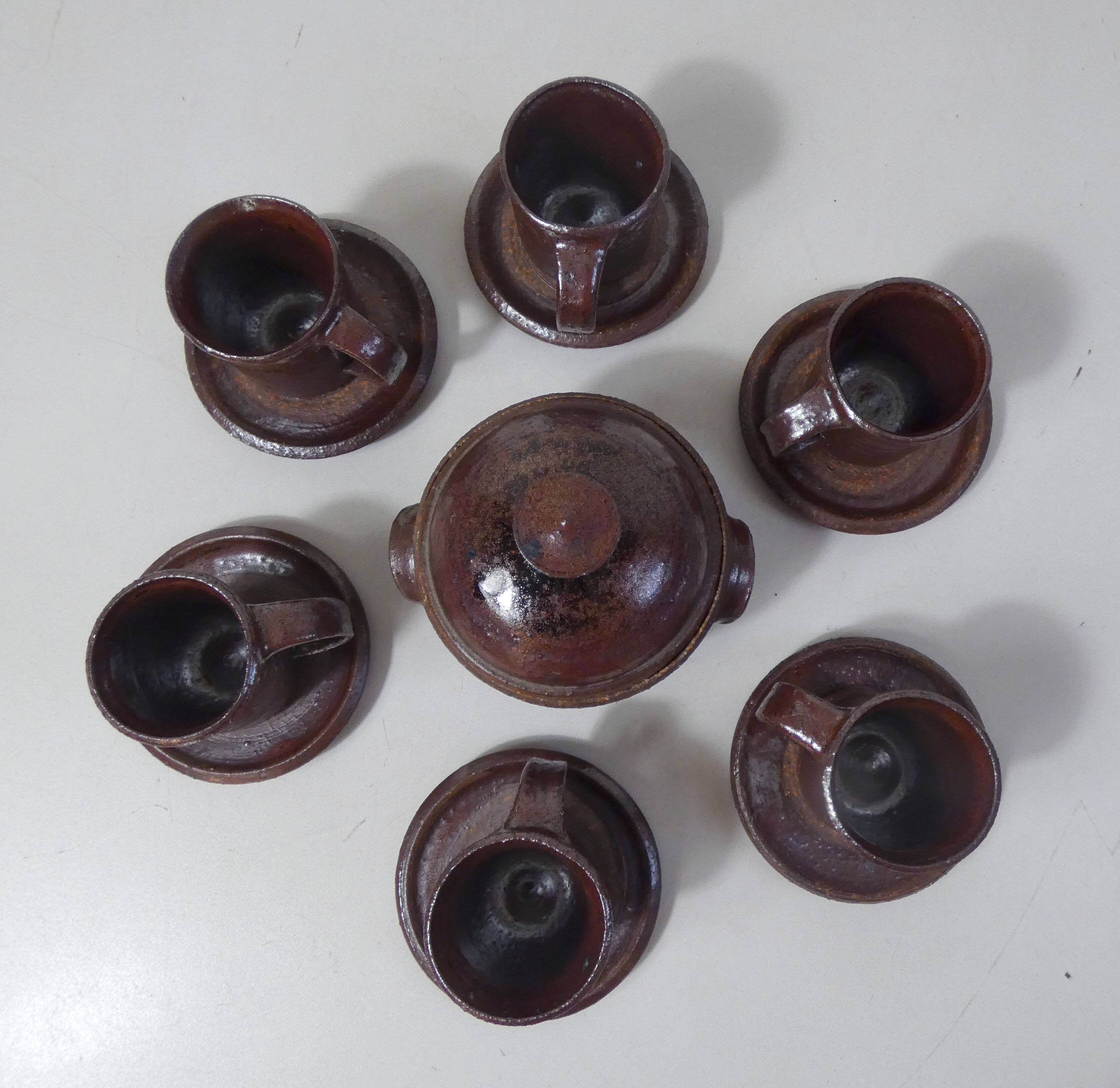 coffee service in iridescent stoneware cups and vintage sugar bowl