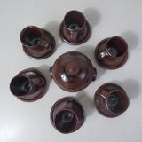 coffee service in iridescent stoneware cups and vintage sugar bowl