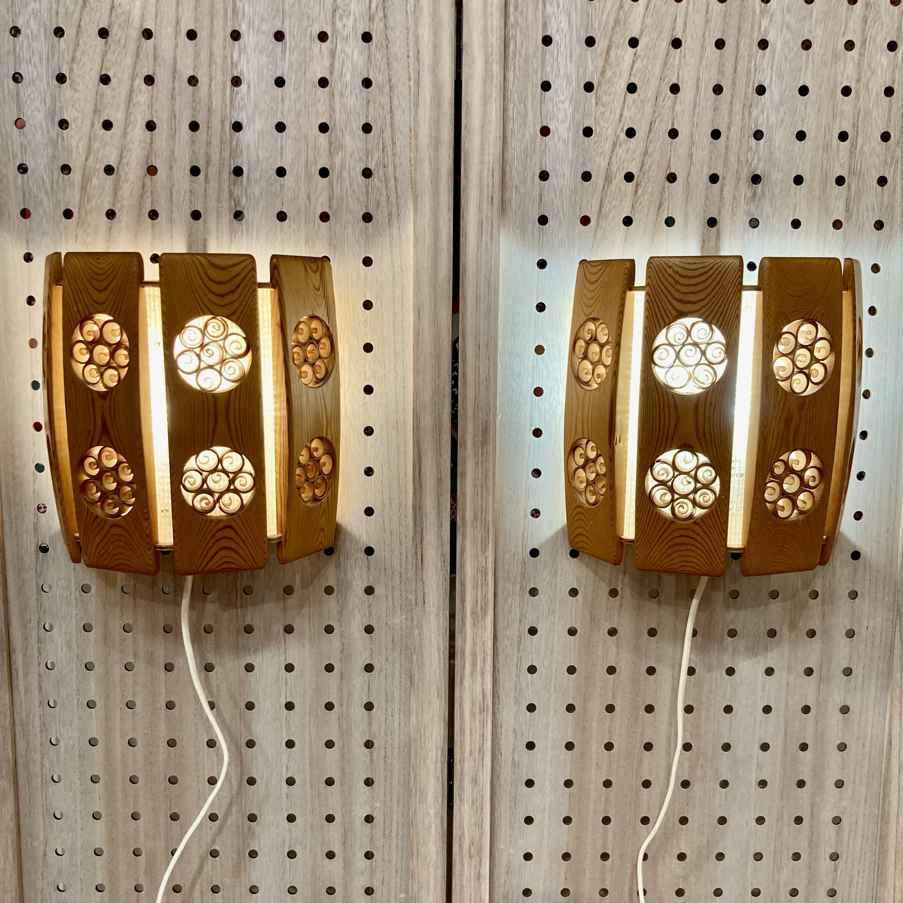 A pair of large scandinavian design wall lights from the 1950s.