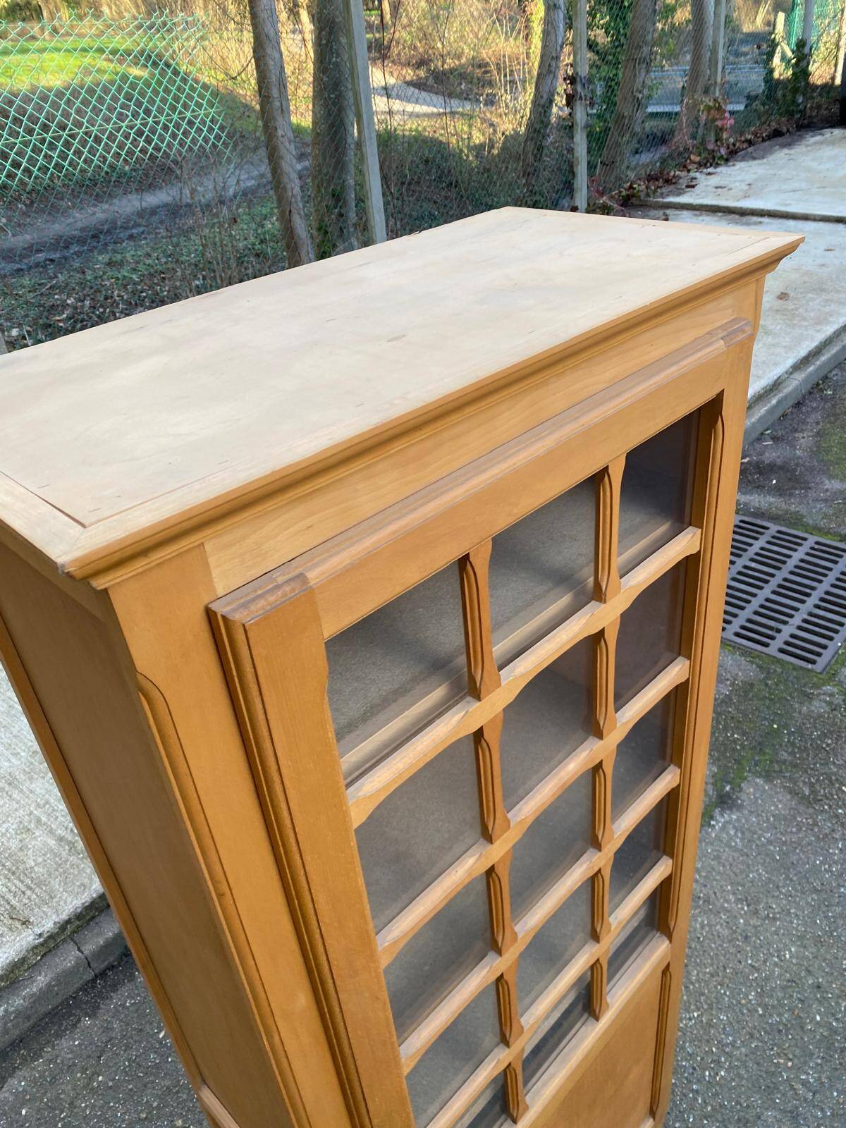 Parisian glass-fronted wardrobe in light wood from the 1960s.