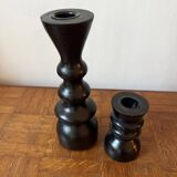 Pair of black turned wood candlesticks