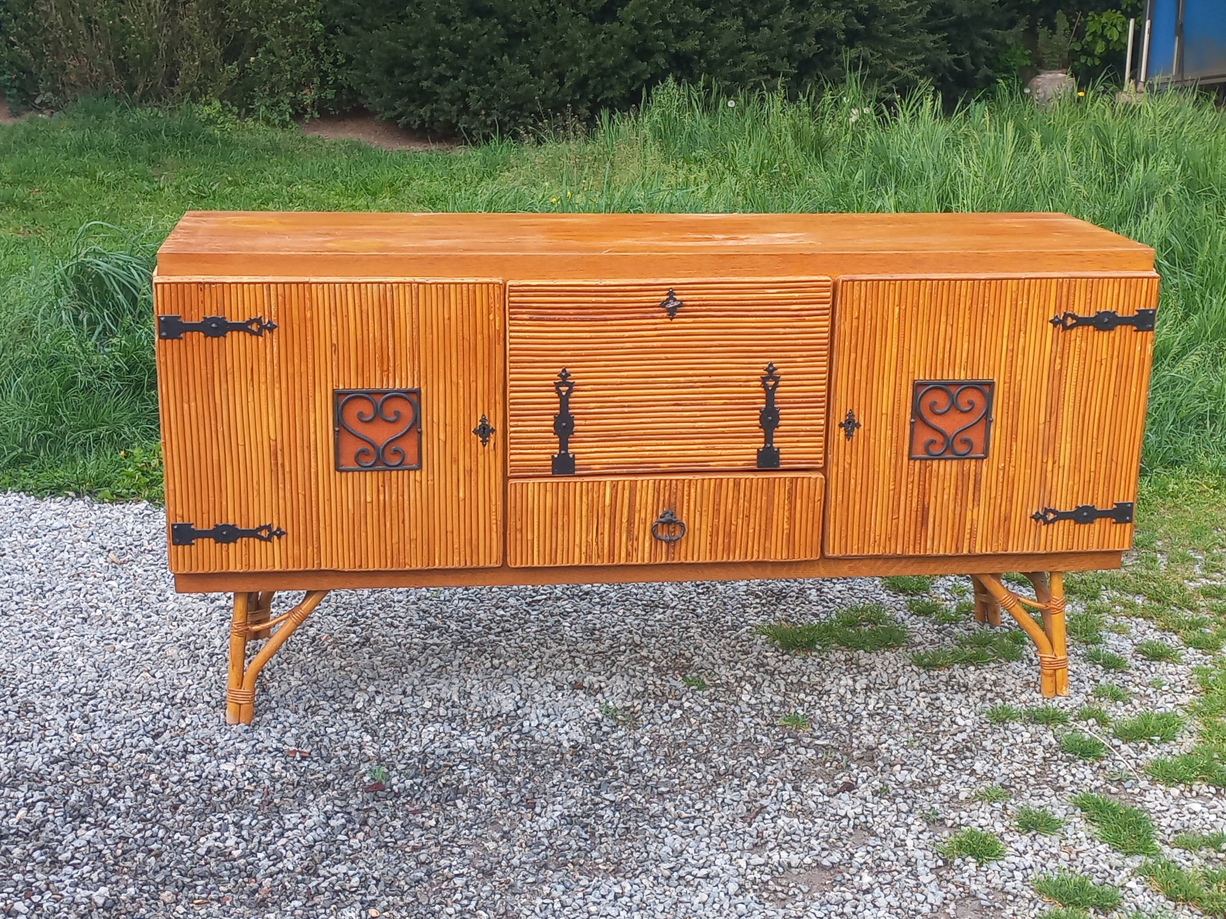 Bamboo and rattan enfilade attributed to Audoux and Minet.