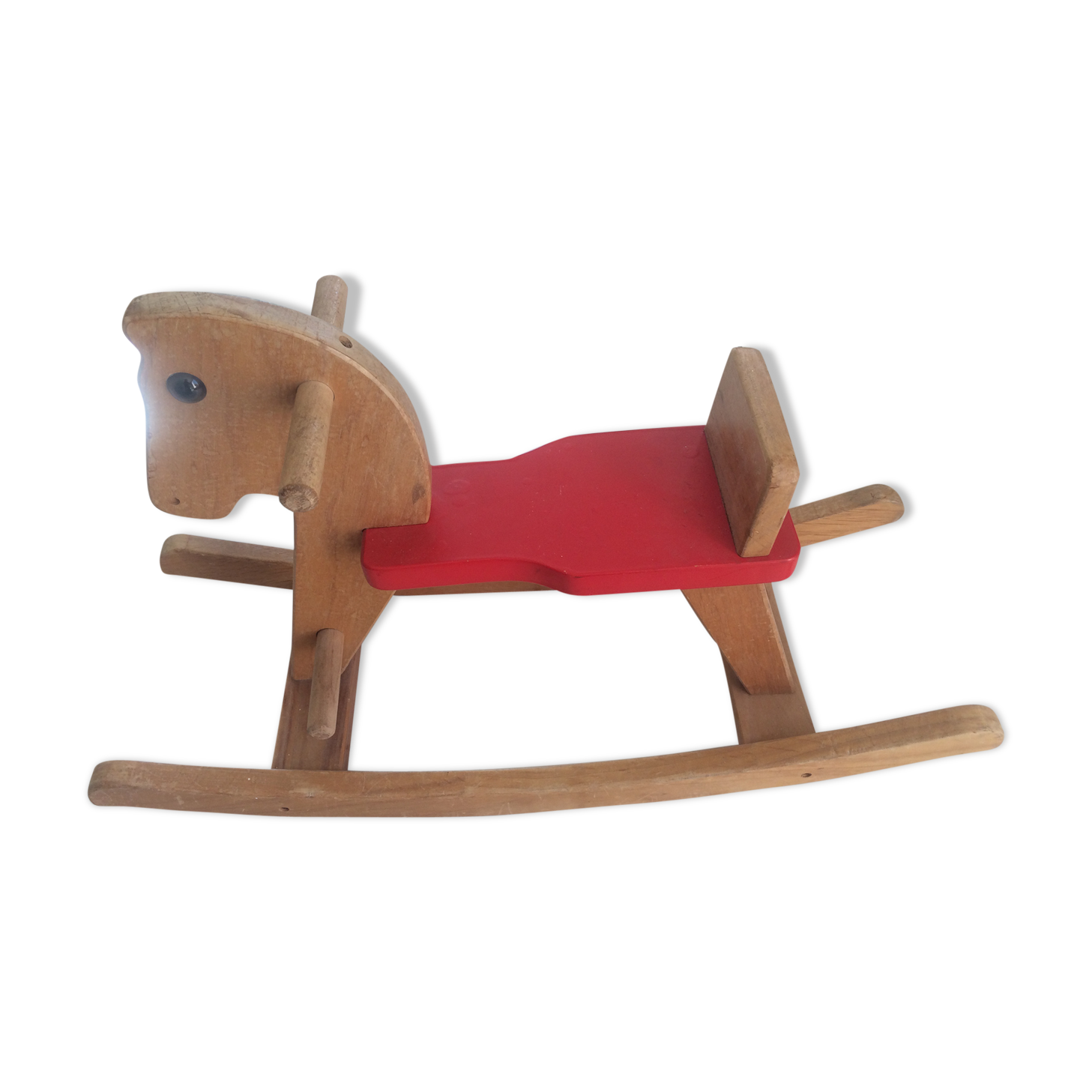 Rocking horse of the 70's in light wood