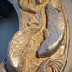 Wall-mounted mirror with silver fish by Alan Wallis Designs from the 1980s.