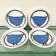Handmade white ceramic plates with a blue bird in folk art style, set of 4.