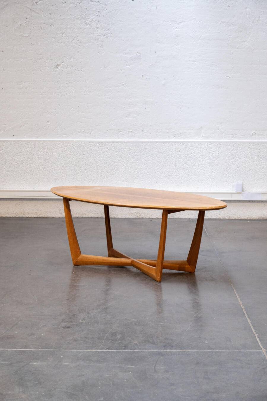 Oval teak coffee table