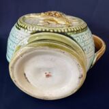 Small onnaing barbotine jug with lion decoration