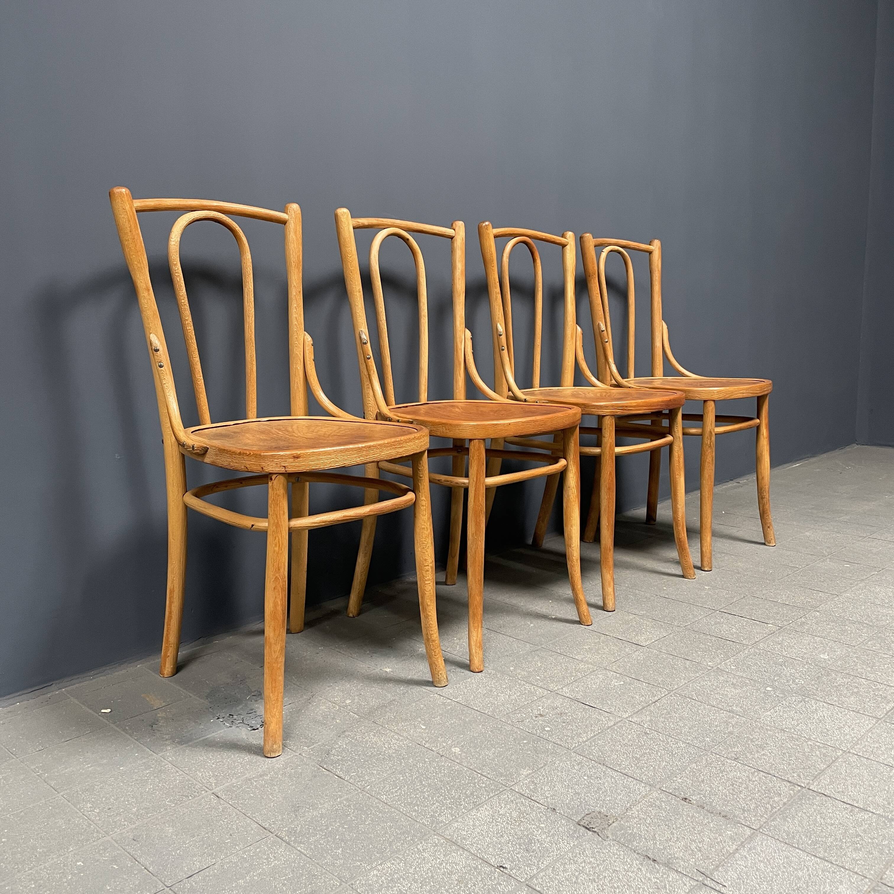 Set of 4 wooden bistro chairs with graceful seats