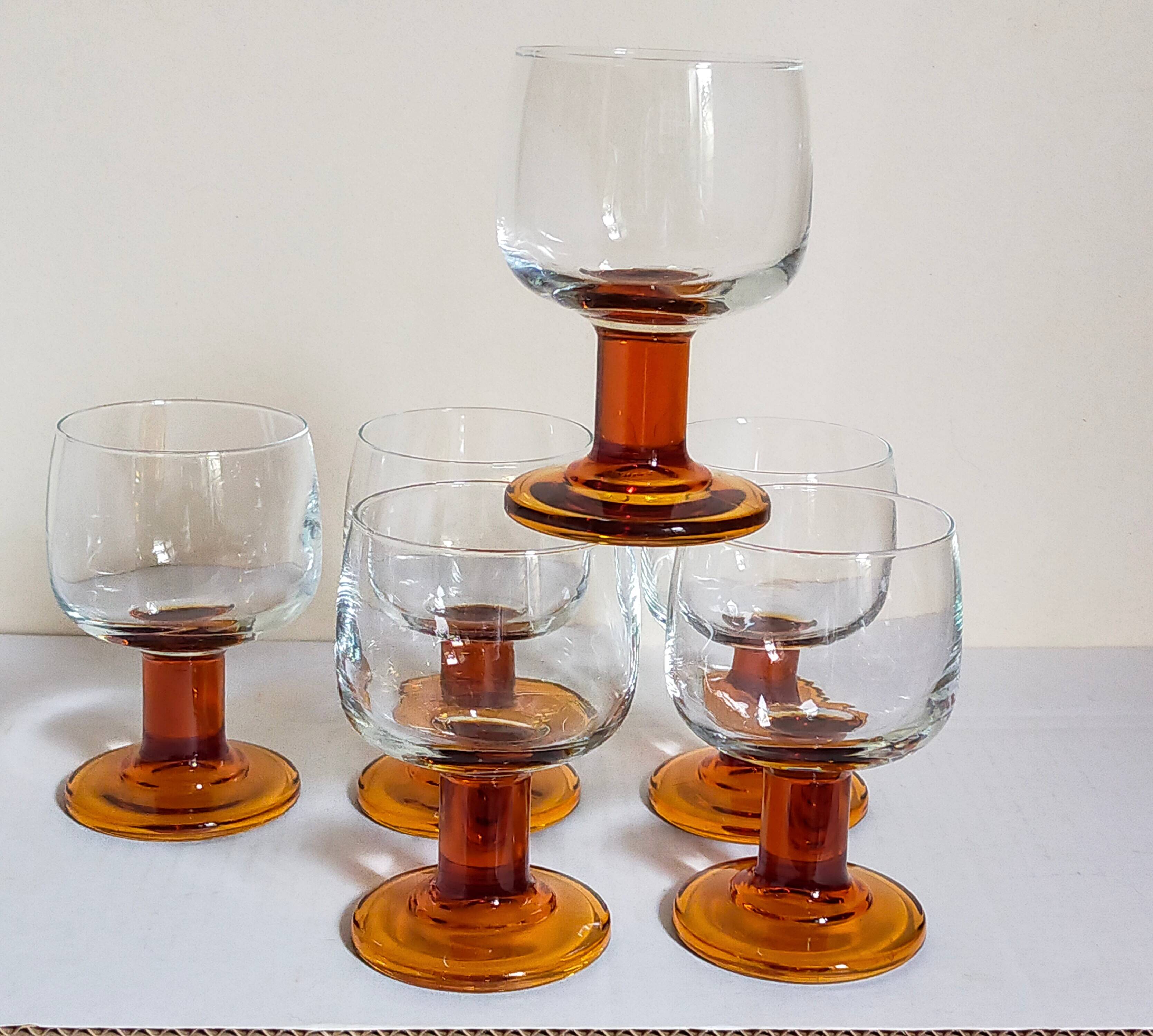 Six amber stemmed glasses from the 70s