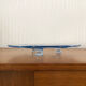 Blue transparent glass pie dish on vintage stand