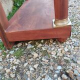 Console in old Empire style with a wooden frame and marble top.