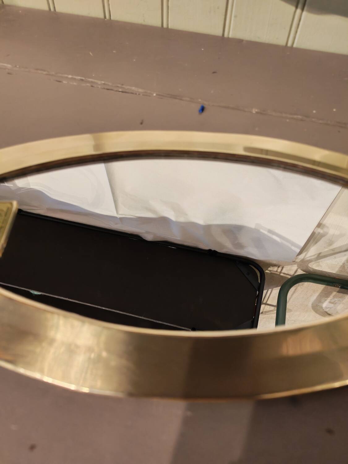 Vintage Urdu mirror in brass