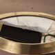 Vintage Urdu mirror in brass