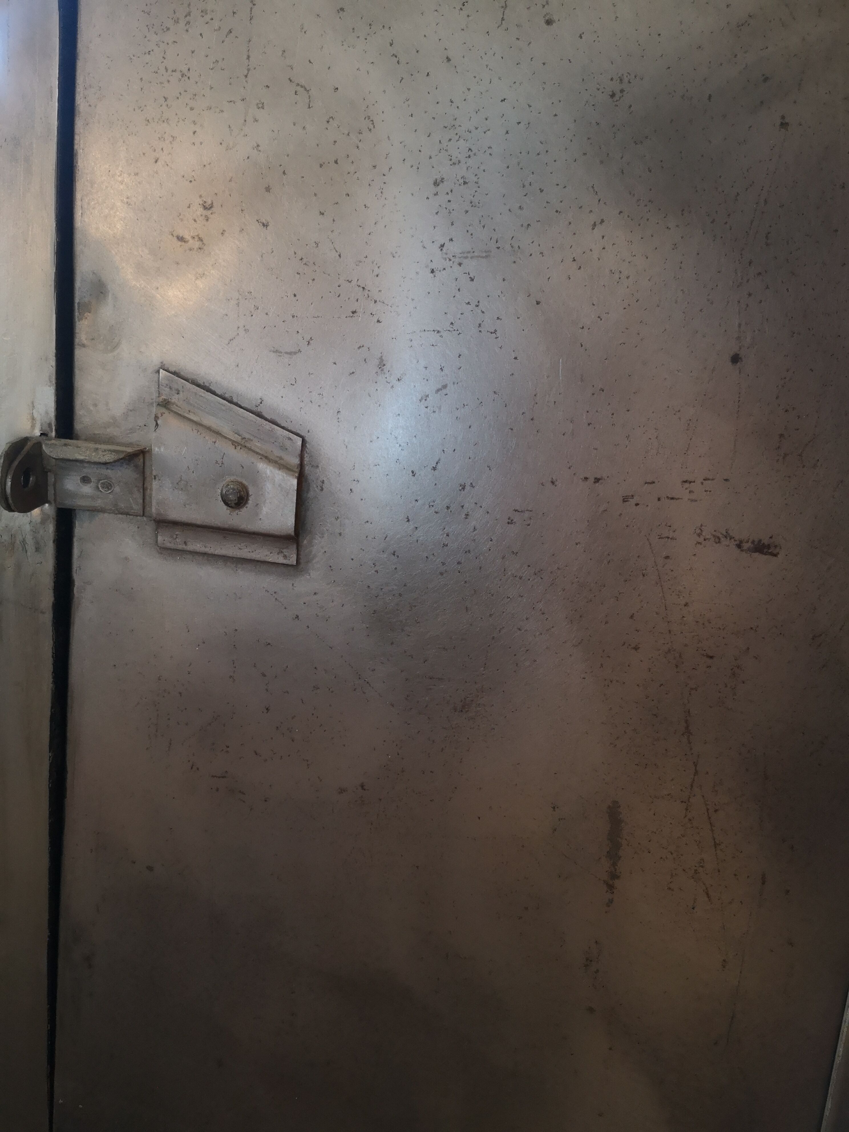 Cloakroom a waxed pickled metal door