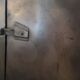 Cloakroom a waxed pickled metal door