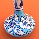 Ceramic vase with floral decoration Height: 100mm Diameter (at the neck): 30mm In