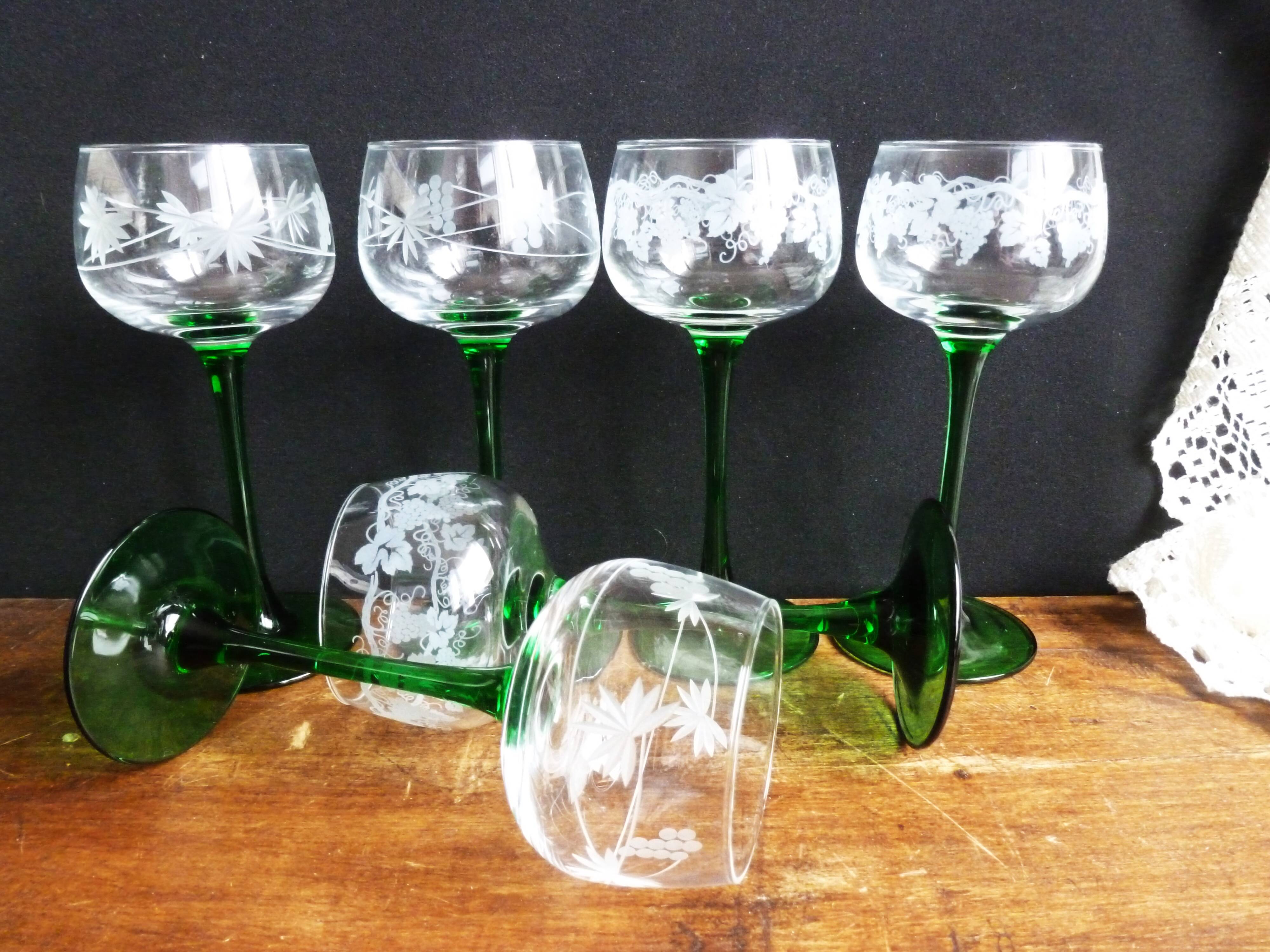 Alsace wine glasses, white wine glasses, green stemmed table glasses.