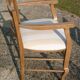 Fauteuil à accoudoirs dossier bas