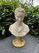 Alabaster bust of a woman signed Arnaldo Giannelli.