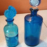Set of two blue glass bottles