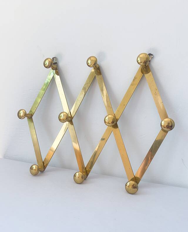 Brass accordion coat rack