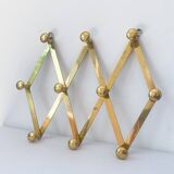 Brass accordion coat rack