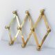 Brass accordion coat rack