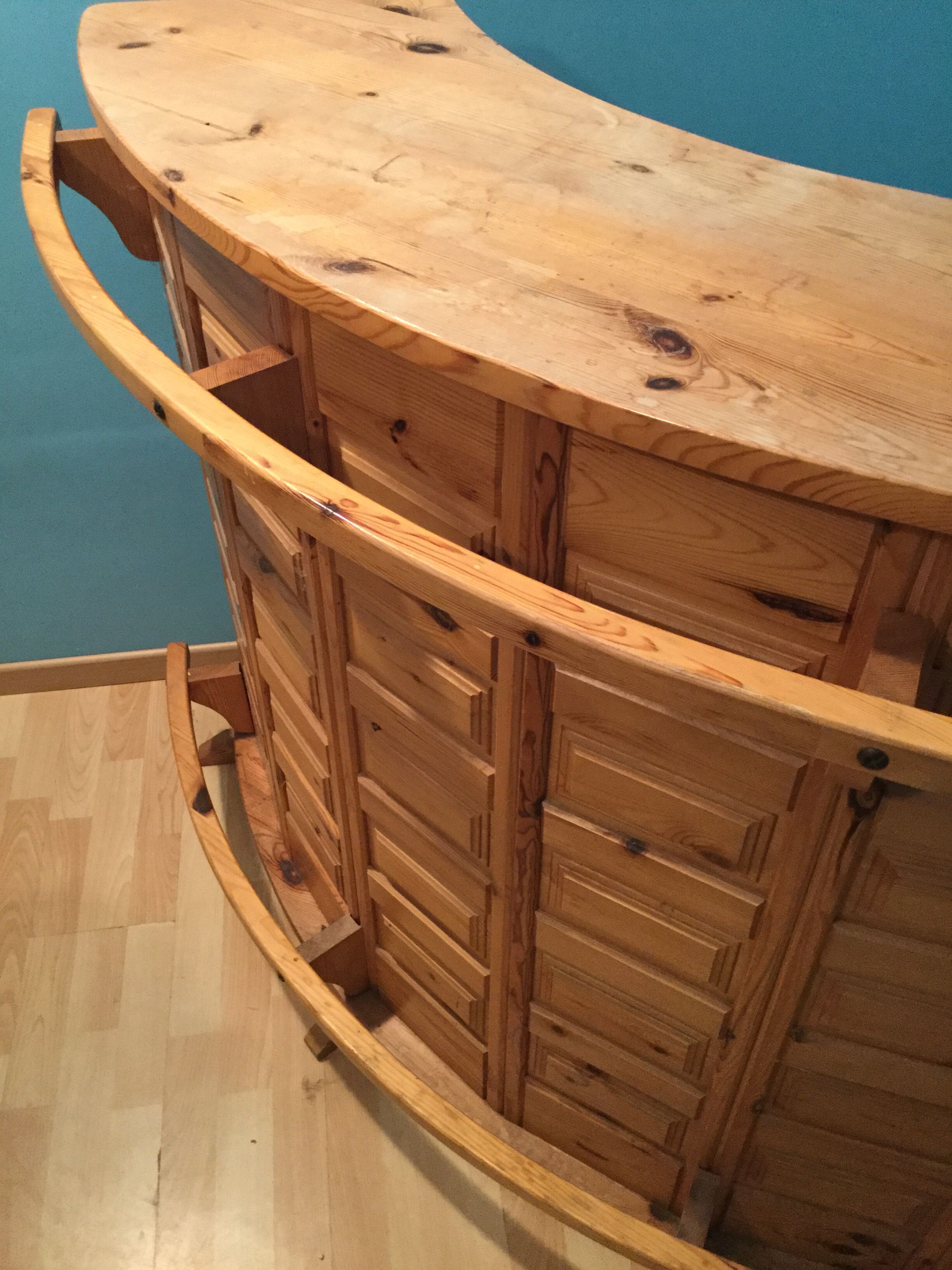 Vintage bar counter with natural wood stools