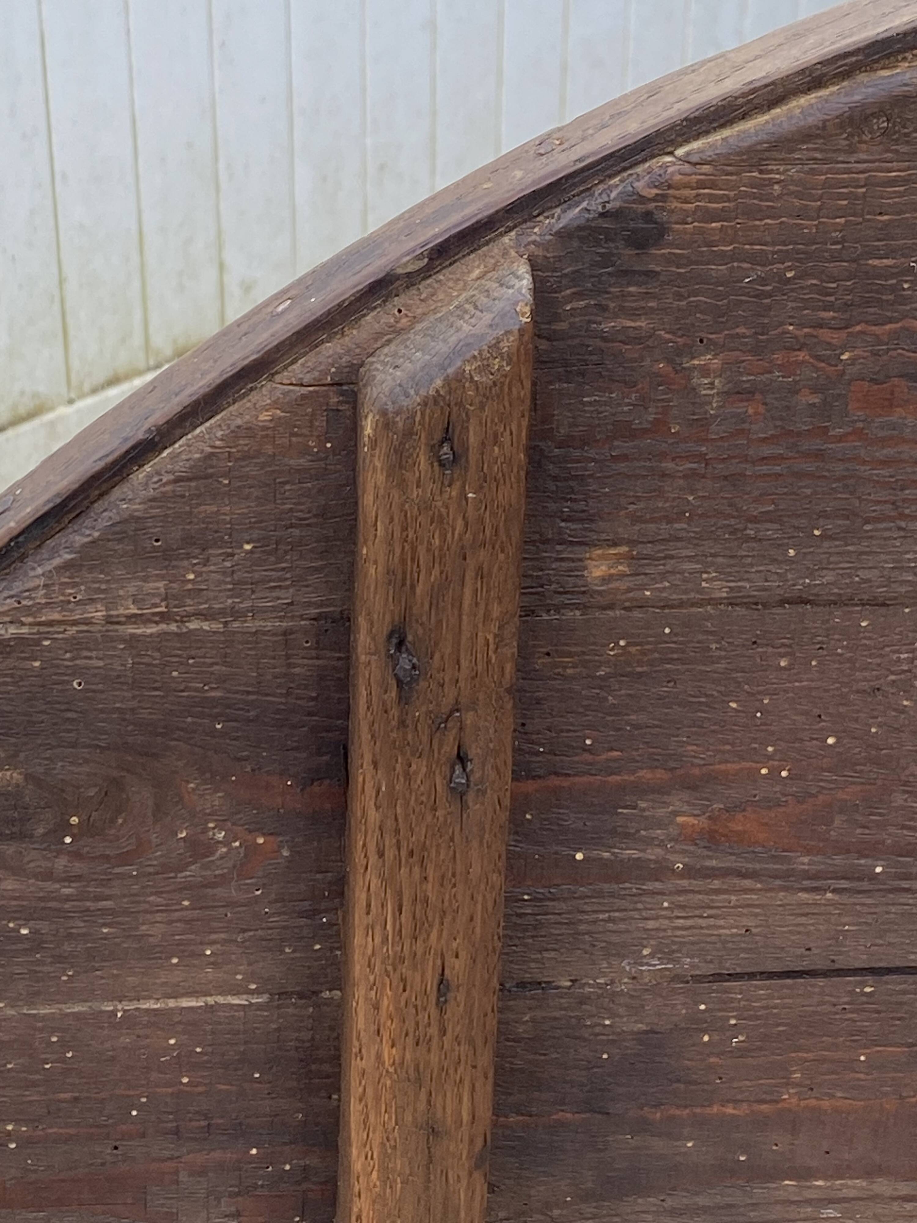Old folding round winemaker's table with a tilting top.
