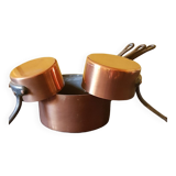 Series of 5 tinned copper saucepans. Great height.